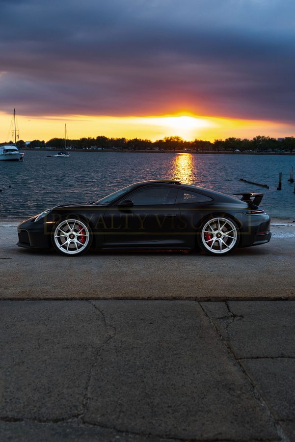 Side-rear profile of the GT3 at sunset
